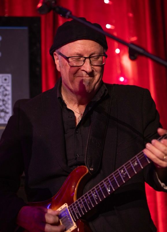 The guitarist mid-solo